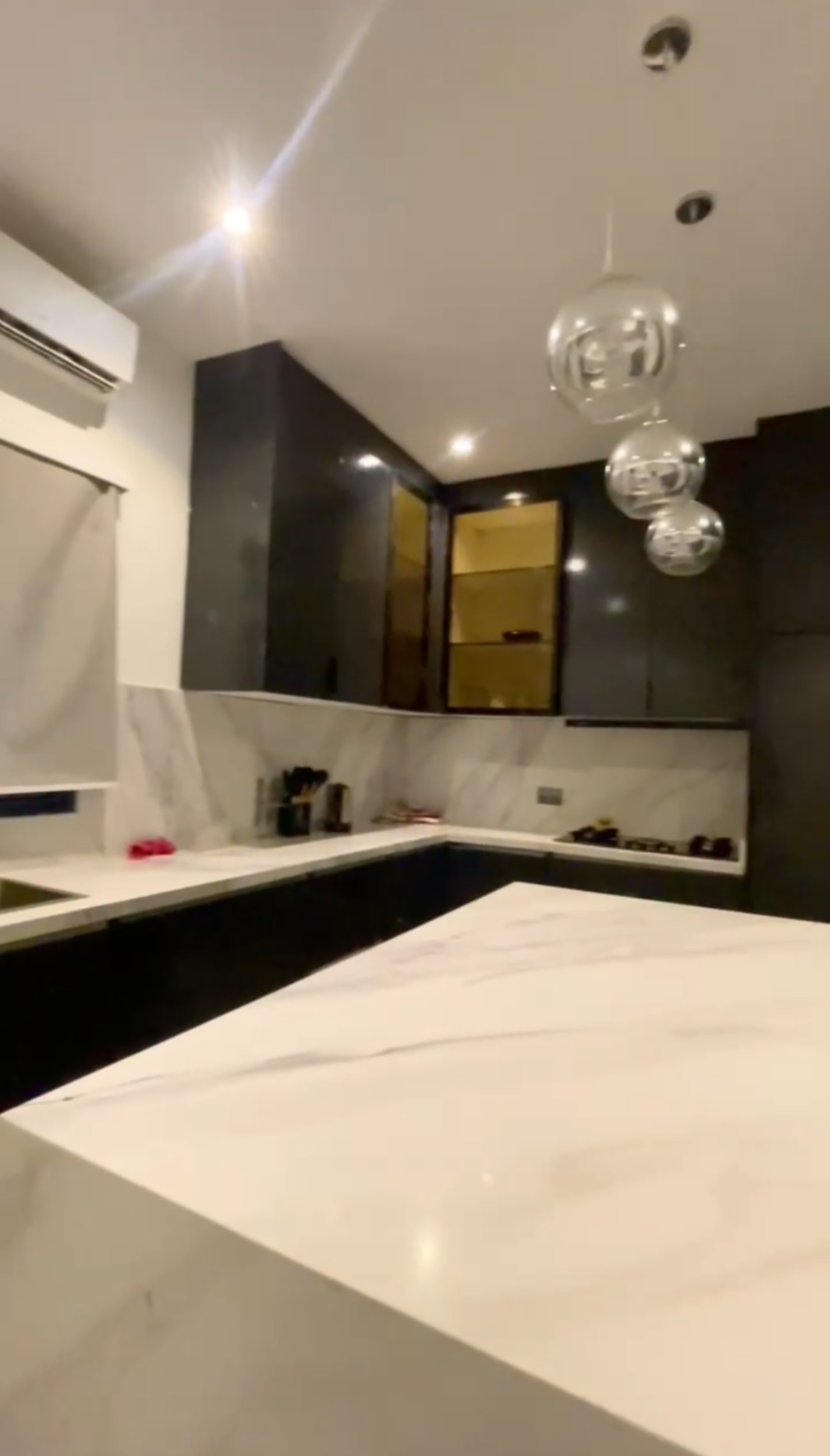 Own a rare fully furnished 4-bedroom corner-piece terrace duplex with BQ in the prestigious Jahi-Gilmore axis